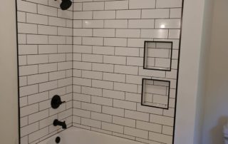 shower subway tile and glass doors